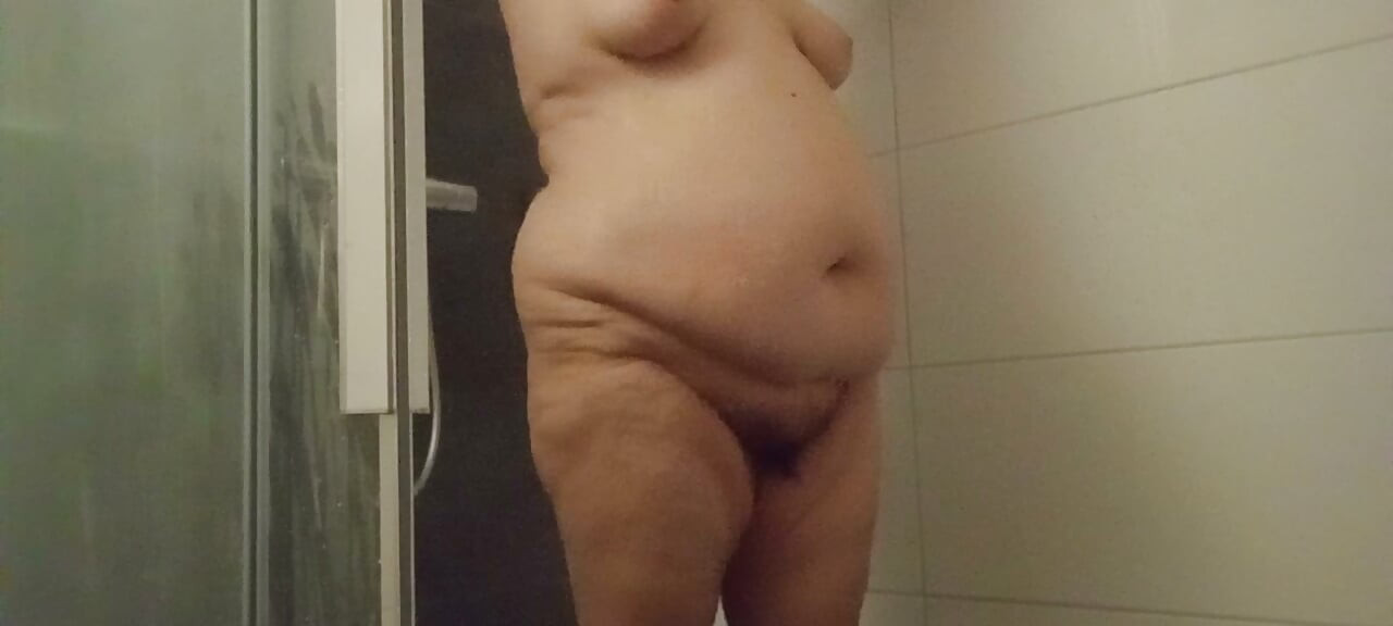 53 year old BBW showers her hairy pussy and big belly