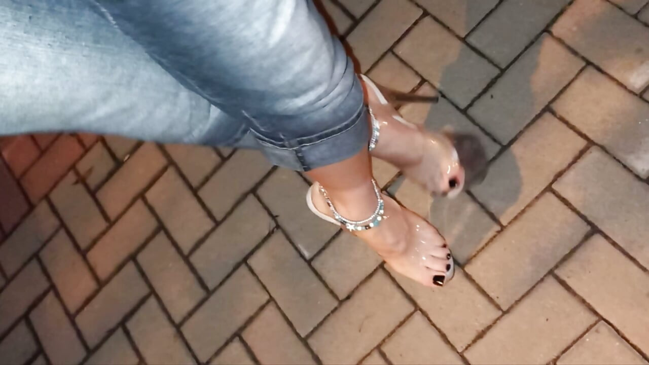 nighttime crossdressing on a public street in 20cm stripper heels, black toes, and black claws