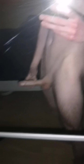 Teen boy with long big dick infront of a mirror