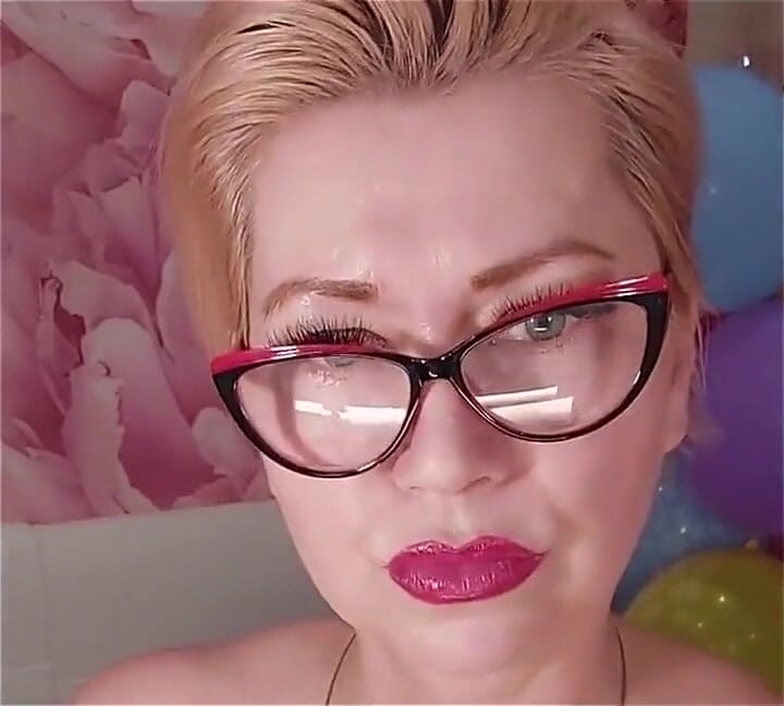 Dildoing of a Mature Bitch on a Background of Colorful Balloons