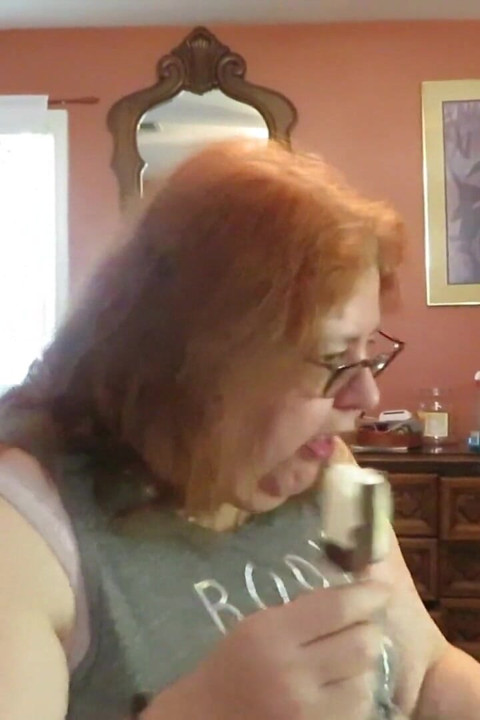 BBW nurse Vicki enjoys eatting a chocolate vanilla ice cream popsiscle