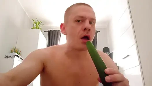 Putting a cucumber in your ass and mouth