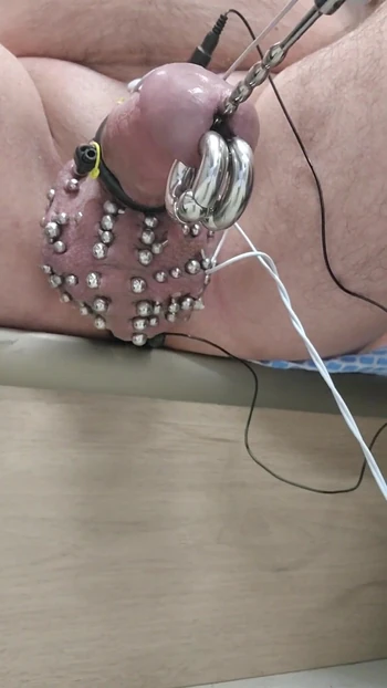 Emotional moment from "Double 00 prince albert piercings, heavily pierced scrotum estim stimulation until thick cum flows"