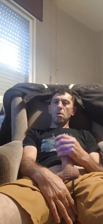 Guy masturbating on the sofa