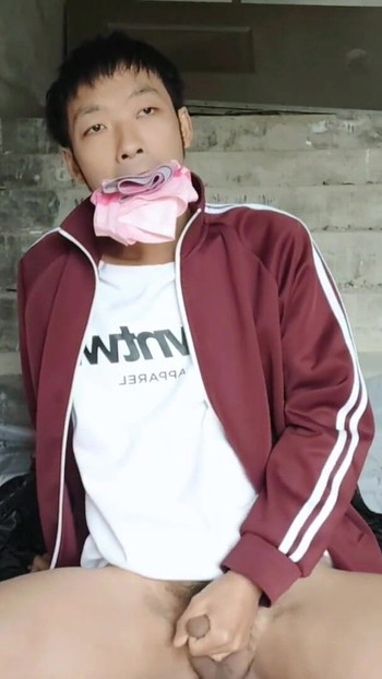 Jaw-dropping moment from "Cute Asian boy masturbates and ejaculates in the stairwell of construction site"