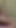 Mini etekli çinli elbiseli büyük memeli kız sandalyeye otururken ve parmakla muamele yaparken masanın altından izleyin | Klip 1
