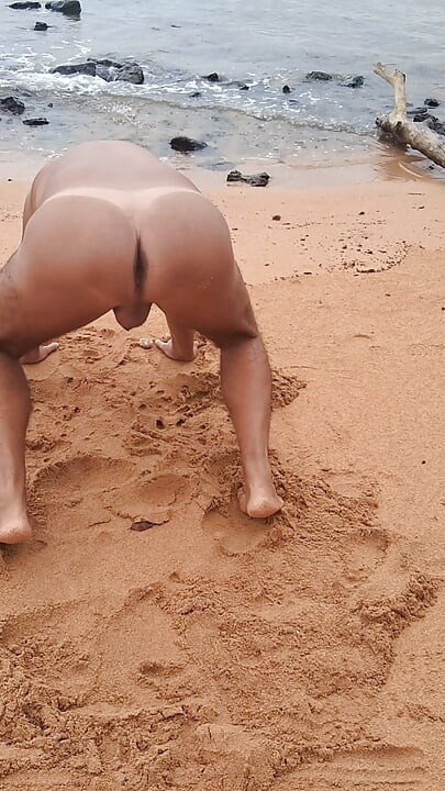 Ladysilva on the beach naked showing off her big sexy ass tanned with mark