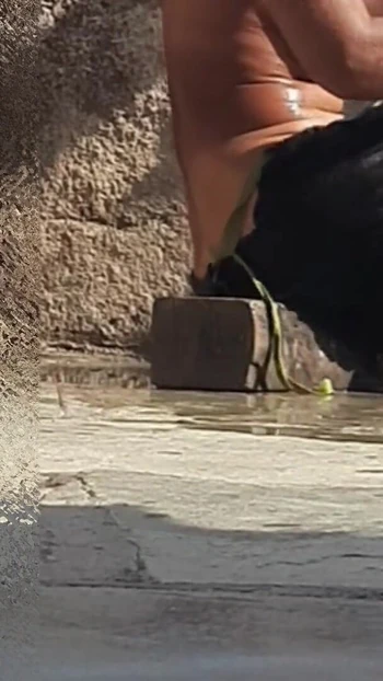Spectacular moment from "Indian sister-in-law is bathing in the open courtyard of the house, putting a finger in her burrow"