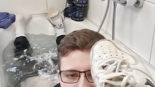 Fun in the bathtub with sneakers