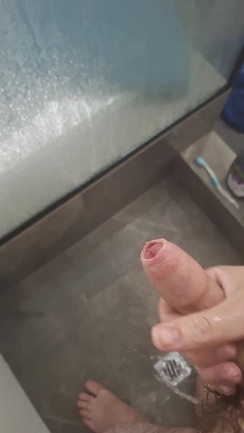 Uncut hairy aussie plays with cock in the shower
