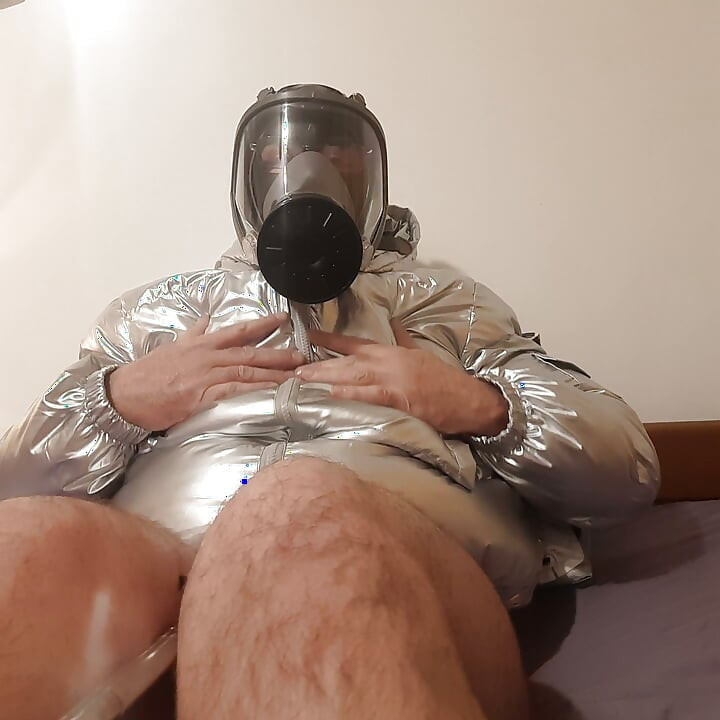 Masking up in my new silver puffer