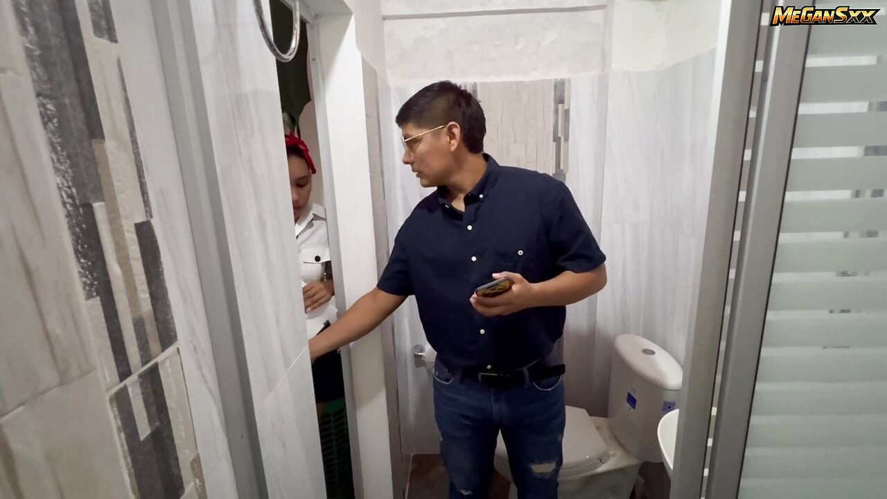 Teacher his student in the bathroom.