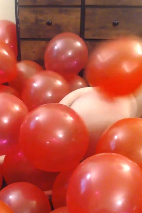 Naughty Milf in red balloons