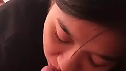 Chinese girlfriend gives a blowjob