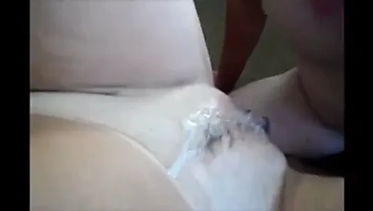 Cleaning his cum off her pussy
