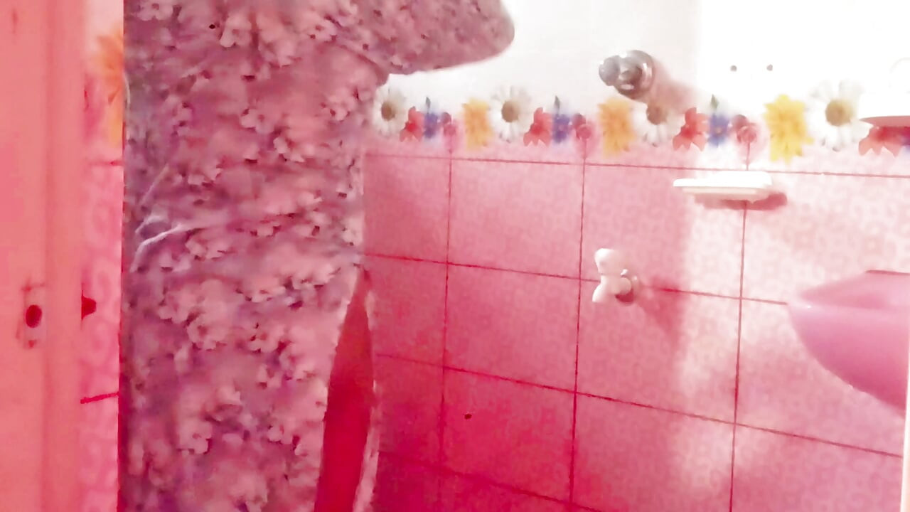 A Bangladeshi-Bihari woman is engaging in romantic sex inside the bathroom while bathing.