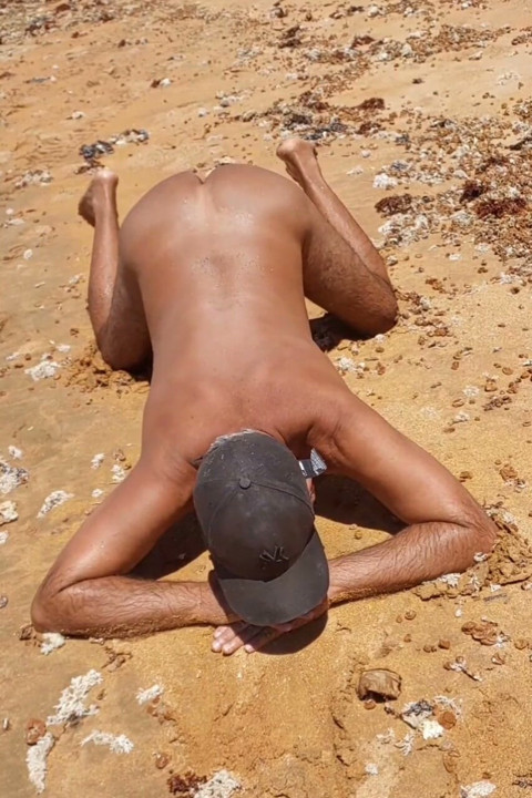 Ladysilva on all fours naked on the beach comes fuck my ass