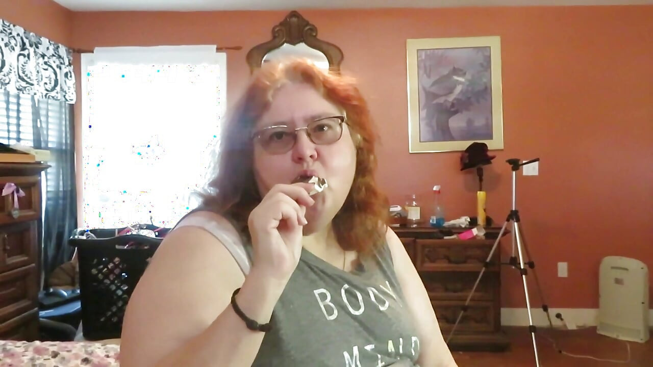 BBW nurse Vicki enjoys eatting a chocolate vanilla ice cream popsiscle