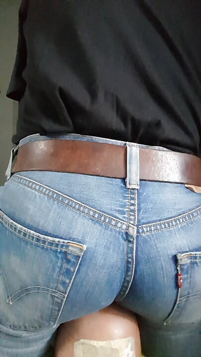 My jeans-butt riding the face of my sitting-doll