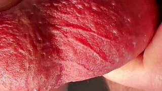 Close-up testicles massaging until big cumshot
