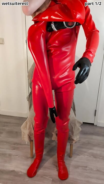Putting on heavy rubber hazmat suit 1mm thick latex with gasmask