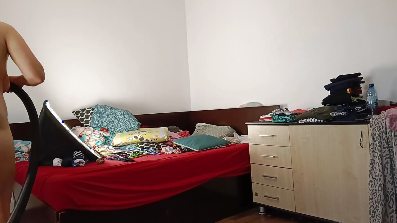 Amateur wife vacuuming in the bedroom. Amateur wife gives me a handjob until I cum.