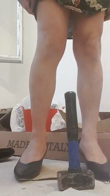 Travesti o punho de um martelo