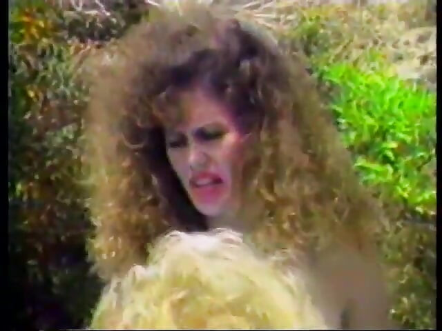 Retro lesbian blond gets her asshole fucked using dildo outdoors