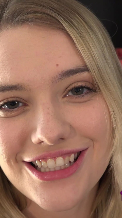 Kenna James is in a fishnet catsuit while she blows a dildo