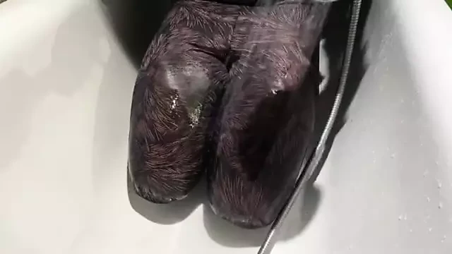 Wetlook in bathroom. Wet leggings and polo t-shirt in shower.