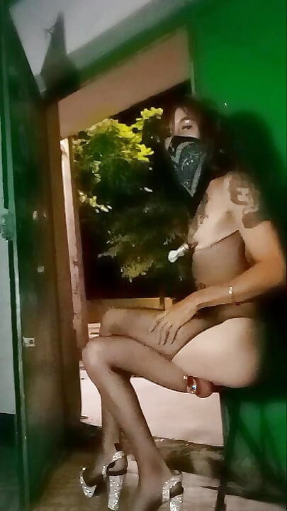 Exhibitionist transvestite goes out at night