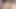 teen naughty girl in a bunny costume laying easter eggs