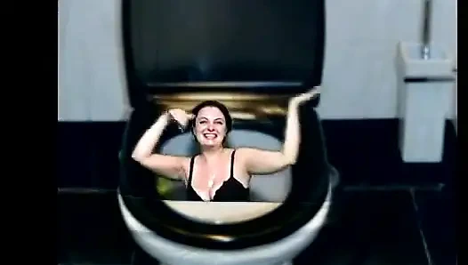 Kate flushing herself to the toilet while dancing part by part of her body