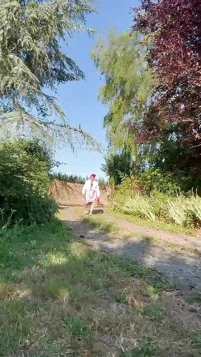 In little maid outfit with a short fuchsia skirt for a day