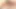 Tanned ladyboy in leopard dress jerks off her small cock on
