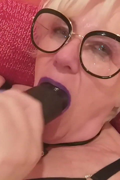 Horny Woman Inserts an Oversized Black Dildo