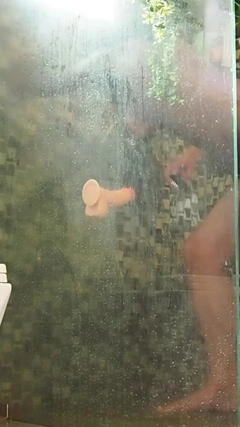 Powerful moment from "Caught milf playing in shower and joined her for a blow and fuck"