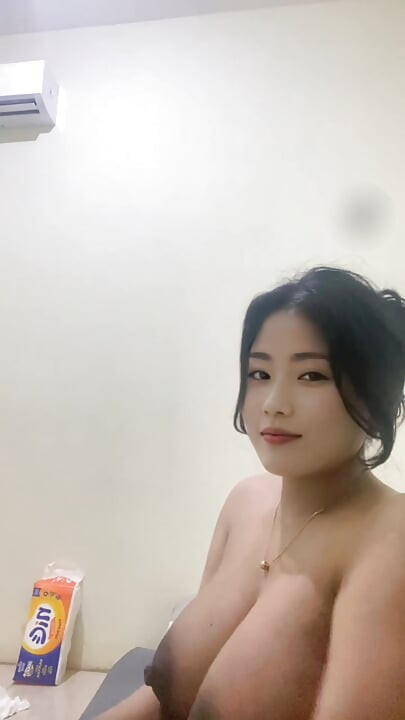 young stepmother is so horny that she squeezes her own breasts