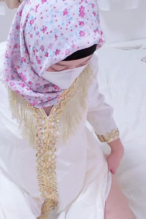 A Malaysian Hijabi Girl Teasing with White Abaya Showing off Her Ass