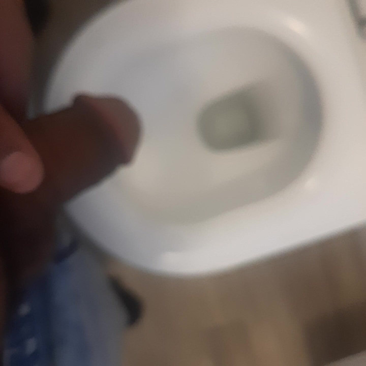 Pissing in women's toilet.