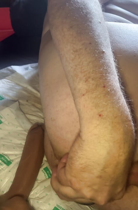 Grandpa puts on a side dildo and touches his cock at the same time
