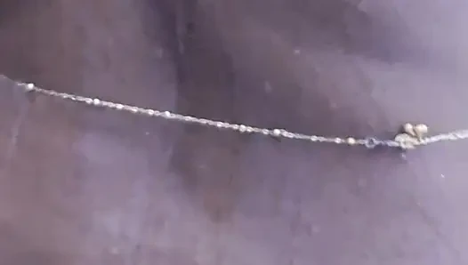 Young girl stripping and taking bath