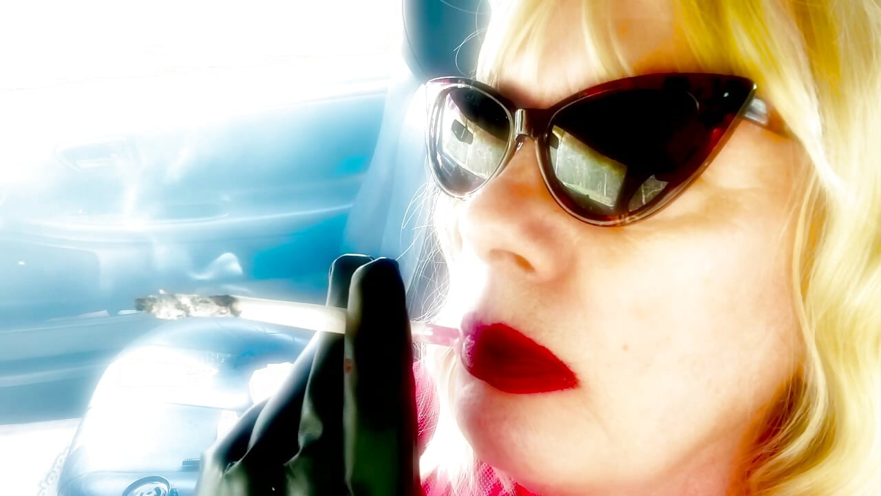 MATURE BLONDE SMOKING VS120 MENTHOLS WITH CAT SUNGLASSES