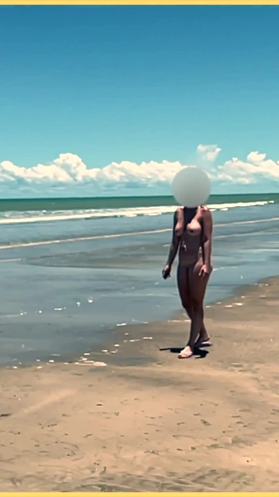 Jaw-dropping moment from "Wifey strips nude and plays with the football at the beach"