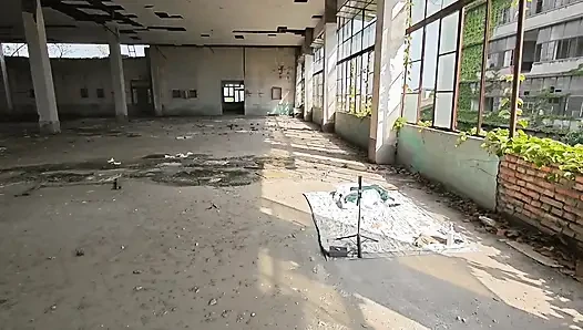 Cute Asian boy masturbates, moaning, ejaculating, and swallowing semen in a sunlit abandoned factory