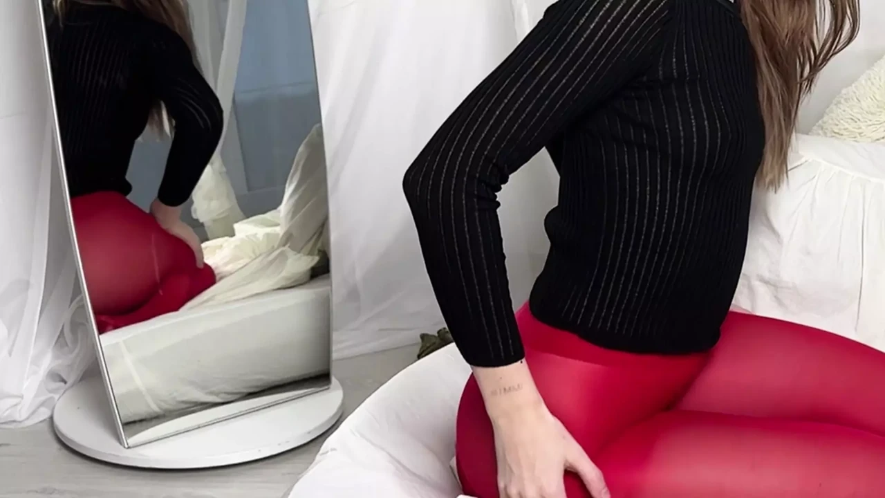 stretching in tight red tights without panty