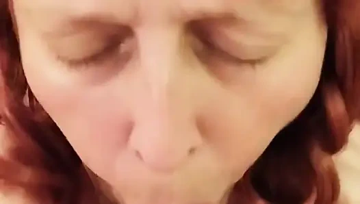 Mature Redhead Enjoys Licking Cock