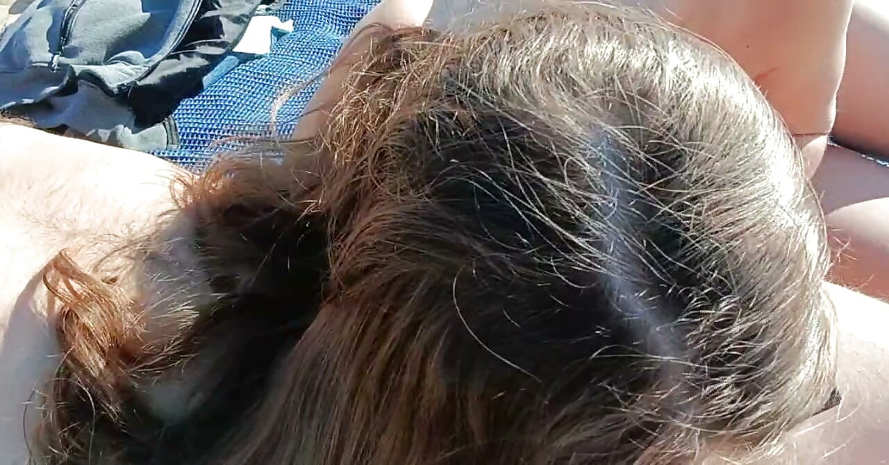Stepdaughter publicly gives her stepfather a blowjob on the beach.