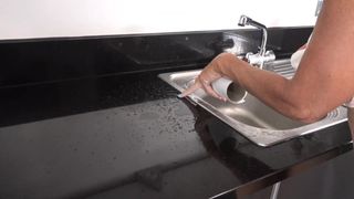 mature granny pissing in sink