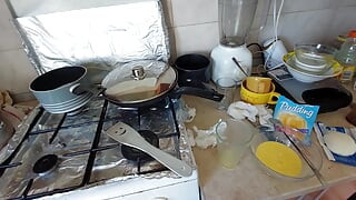 Sexy wife prepares breakfast naked in the kitchen.